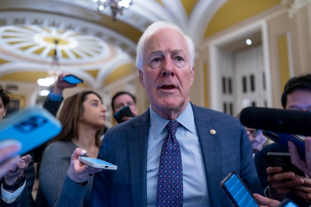 Sen. John Cornyn speaks to reporters at the Capitol on Wednesday, Feb. 7, 2024. 