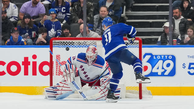 Max Domi #11 of the Toronto Maple Leafs scores against Igor Shesterkin #31 of the New York Rangers during the shootout at Scotiabank Arena on March 02, 2024 in Toronto, Ontario, Canada. 