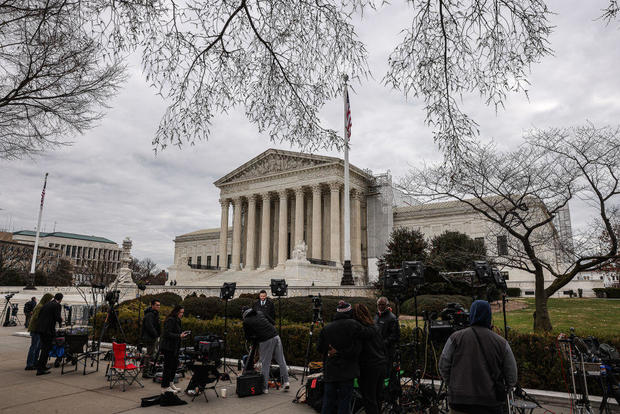 Members of the media outside the Supreme Court in Washington, D.C., on Monday, March 4, 2024. 