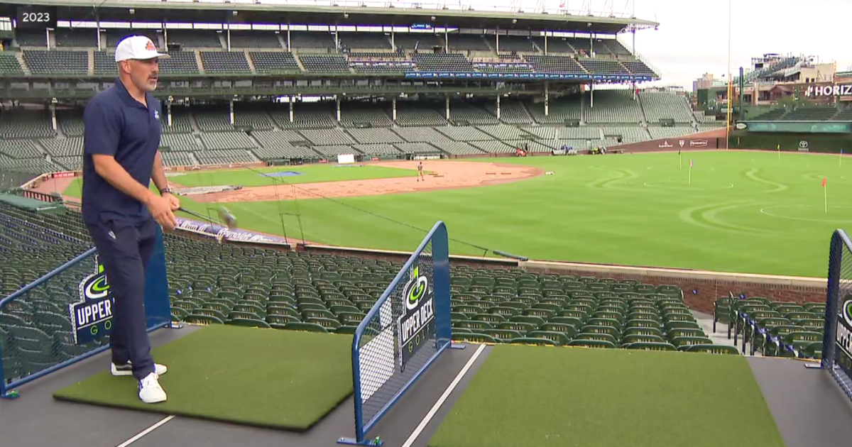 Green shirt pink store hat wrigley field