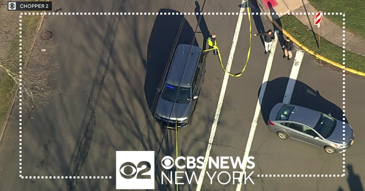 Father, 2 children struck by car while crossing street near school ...