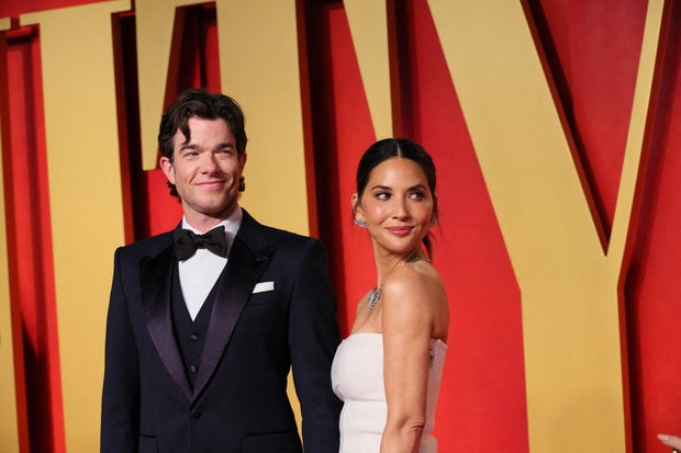 John Mulaney and Olivia Munn arrive at Vanity Fair's Oscars party after the Academy Awards, in Beverly Hills, California, March 10, 2024.