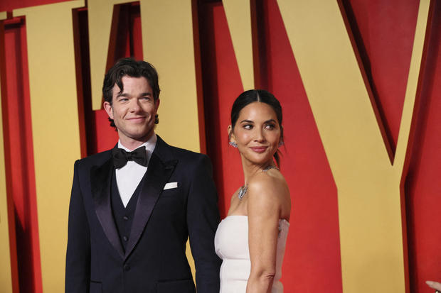 John Mulaney and Olivia Munn arrive at Vanity Fair's Oscars party after the Academy Awards, in Beverly Hills, California, March 10, 2024. 