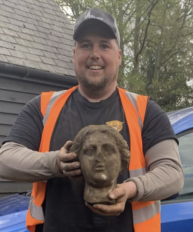 Ancient statue unearthed during parking lot construction: 