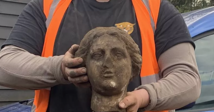 Ancient statue unearthed during parking lot construction A complete mystery  CBS News Ancient statue unearthed during parking lot construction A complete mystery  CBS News