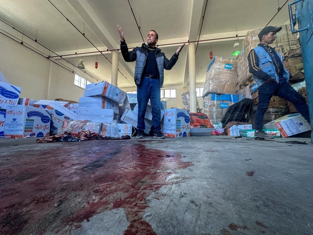 UNRWA says Israeli strike hit Gaza food aid center, killing 1 staffer and wounding 22 others