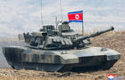 North Korean leader Kim Jong Un guides a military demonstration involving tank units 