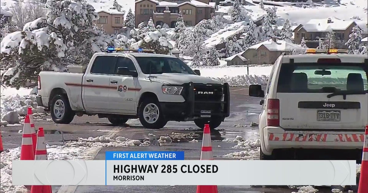 Highway 285 closed Friday as crews removed stuck vehicles, semis after
