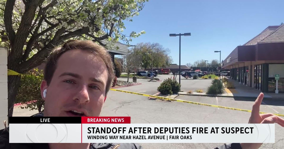 Standoff continues after deputies fire shots at suspect in Fair Oaks