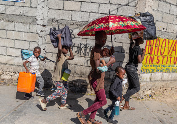 Haitians in the capital Port-au-Prince forced to flee their homes amid spiraling gang violence 