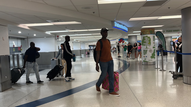 First flight of Americans from Haiti lands at Miami International Airport to escape chaos