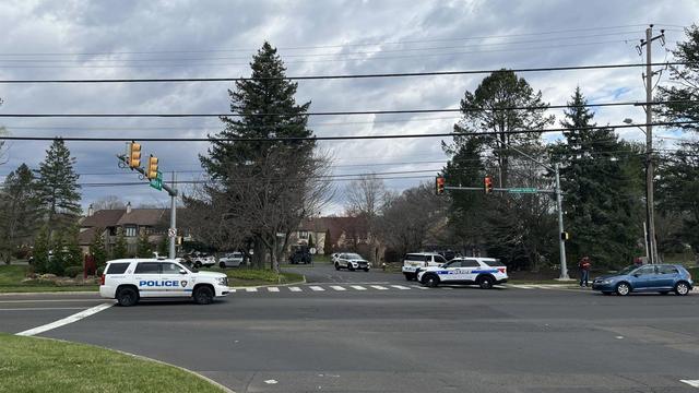 Police near the intersection of Headley Drive and Newtown-Yardley Road 
