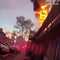 Officers save woman from burning building