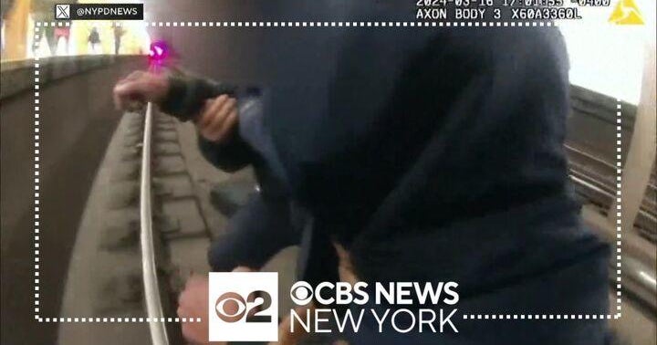 NYPD officers save man who fell onto subway tracks in Brooklyn - CBS ...