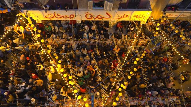  
Thousands pack narrow alleys in Cairo for Egypt's mega-Iftar 
For a decade, one Cairo neighborhood has drawn thousands to gather around Egypt's longest Ramadan Iftar table. This year was the biggest ever. 
22H ago