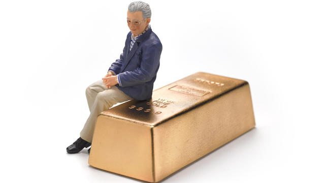 Wedding Figurine Retired Man sitting on gold bar 