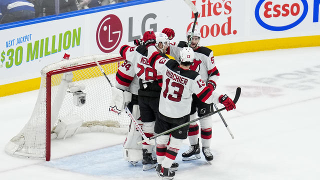 Jake Allen #34 of the New Jersey Devils celebrates with teammates Nick DeSimone #57, Timo Meier #28 and Nico Hischier #13 after defeating the Toronto Maple Leafs at Scotiabank Arena on March 26, 2024 in Toronto, Ontario, Canada. 