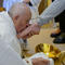 Pope washes feet of 12 women at Rome prison from his wheelchair