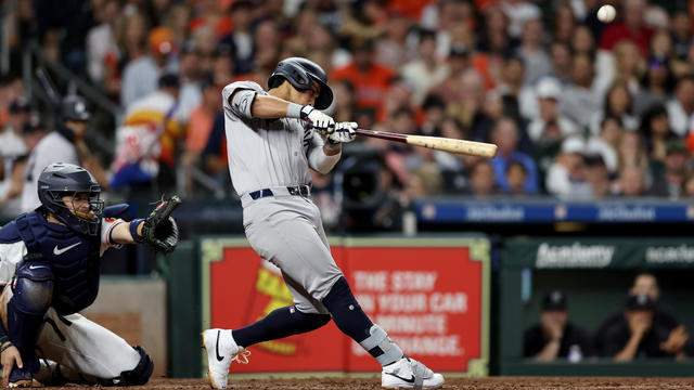 Oswaldo Cabrera #95 of the New York Yankees hits a two run home run in the seventh inning against the Houston Astros at Minute Maid Park on March 30, 2024 in Houston, Texas. 