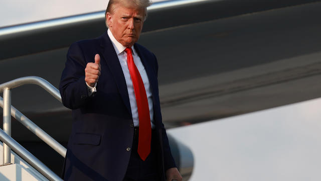 Former U.S. President Donald Trump arrives at Atlanta Hartsfield-Jackson International Airport on August 24, 2023 in Atlanta, Georgia. 