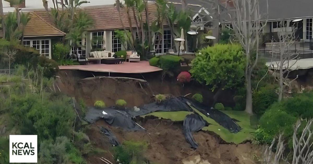 Newport Beach landslide erodes backyards and leaves homes yellow-tagged