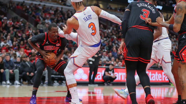 Josh Hart #3 of the New York Knicks kicks Javonte Green #24 of the Chicago Bulls in the head during the first half at the United Center on April 5, 2024 in Chicago. 