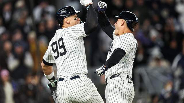 Anthony Rizzo #48 of the New York Yankees celebrates his home run with Aaron Judge #99 of the New York Yankees during the fifth inning of the game against the Toronto Blue Jays at Yankee Stadium on April 06, 2024 in New York City. 