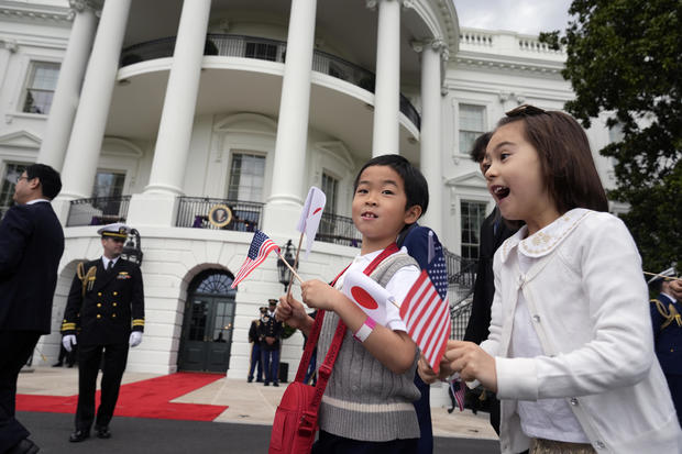 School children arrive to watch President Biden and first lady Jill Biden welcome Japanese Prime Minister Fumio Kishida and his wife Yuko Kishida to the White House on Wednesday, April 10, 2024. 