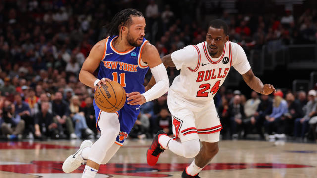 Jalen Brunson #11 of the New York Knicks drives to the basket against Javonte Green #24 of the Chicago Bulls during the first half at the United Center on April 09, 2024 in Chicago, Illinois. 