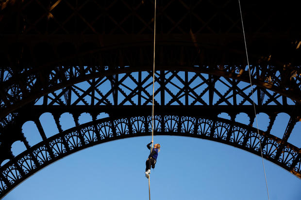 Athlete Anouk Garnier attempts the world record for rope climbing on the Eiffel Tower in Paris 