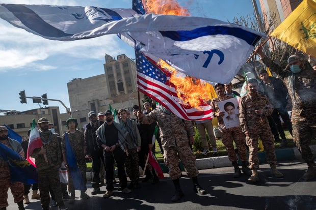how many time travel paradoxes are there Iran-Burning Flags Of The U.S. And Israel