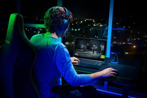 Man using gaming laptop