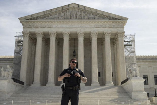 A police outside the Supreme Court on March 26, 2024. 