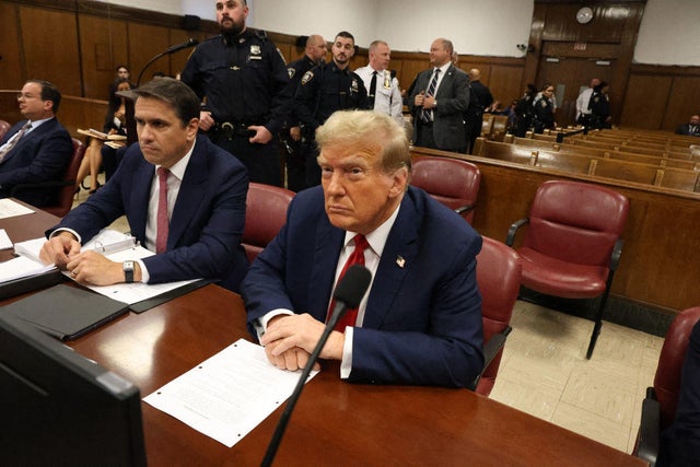 Former President Donald Trump attends the first day of his "hush money" trial at Manhattan Criminal Court in New York City on April 15, 2024.