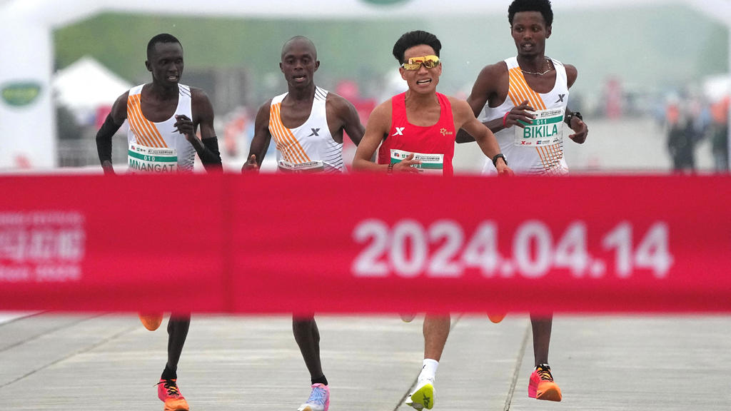 Beijing half-marathon organizers investigating whether competitors let
Chinese runner win