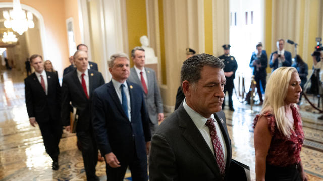 Reps. Marjorie Taylor Greene, Mark Green and other impeachment managers carry the articles of impeachment against Homeland Security Secretary Alejandro Mayorkas into the Senate Chamber on Capitol Hill on April 16, 2024 in Washington, DC. 