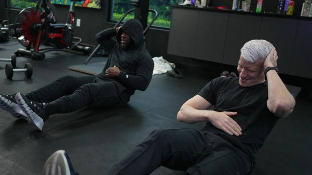 Kevin Hart and Anderson Cooper work out 