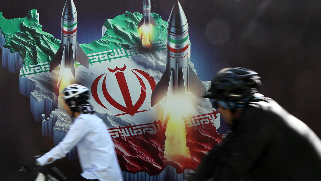 Israel strikes Iran with a missile, U.S. officials say, as Tehran
downplays Netanyahu's apparent retaliation