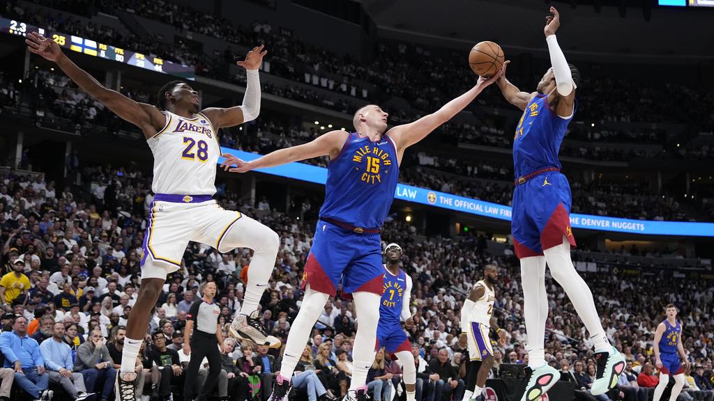 Nikola Jokic leads NBA champ Denver Nuggets past LeBron James and
Lakers 114-103 in playoff opener