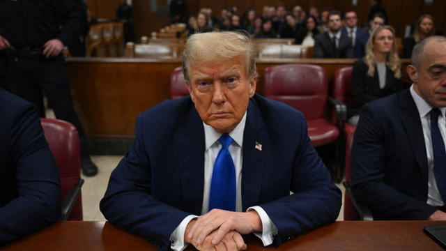 Former President Donald Trump sits in Manhattan Criminal Court 