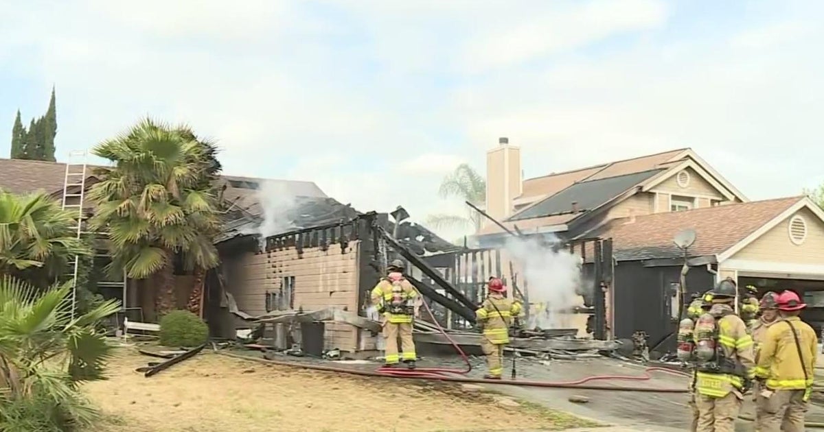 2 detained after fire damages 2 homes in Sacramento County