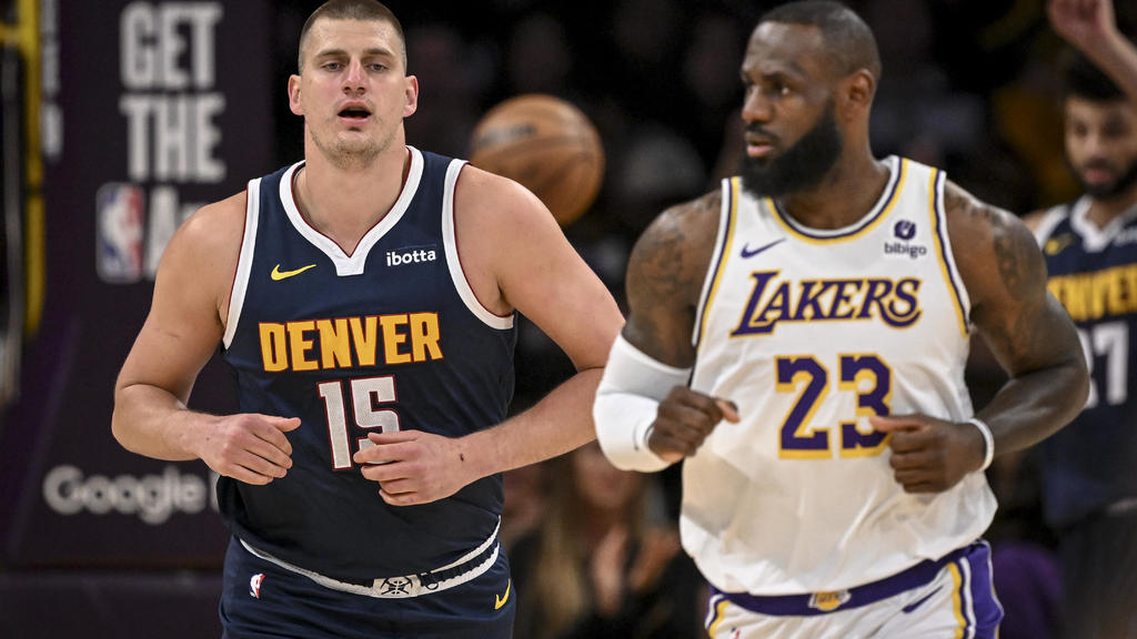 LeBron scores 30, and the Lakers avoid 1st-round elimination with a
119-108 win over champion Denver