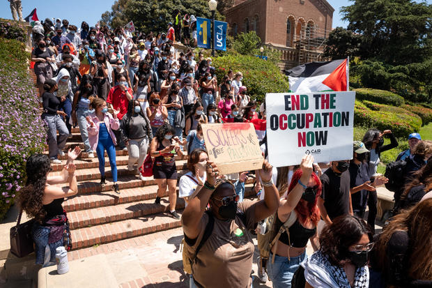 Palestine supporters march at UCLA with faculty 