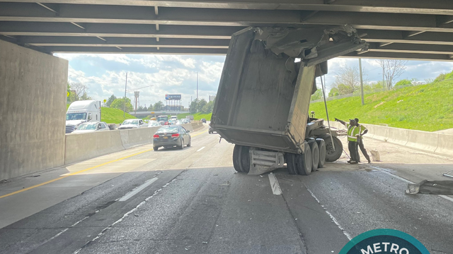Truck stuck under overpass on I-94 in Detroit 