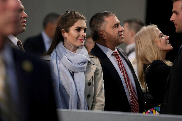 Hope Hicks and David Bossie listen to Donald Trump at his final campaign rally on Election Day, Nov. 8, 2016, in Grand Rapids, Michigan. 