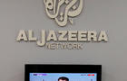 FILE PHOTO: The logo of Qatar-based Al-Jazeera network is seen in one of their offices in Jerusalem 