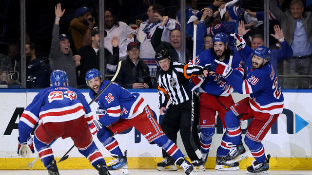 Vincent Trocheck #16 of the New York Rangers celebrates with teammates after scoring the winning goal in the second overtime against the Carolina Hurricanes in Game Two of the Second Round of the 2024 Stanley Cup Playoffs at Madison Square Garden on May 0 