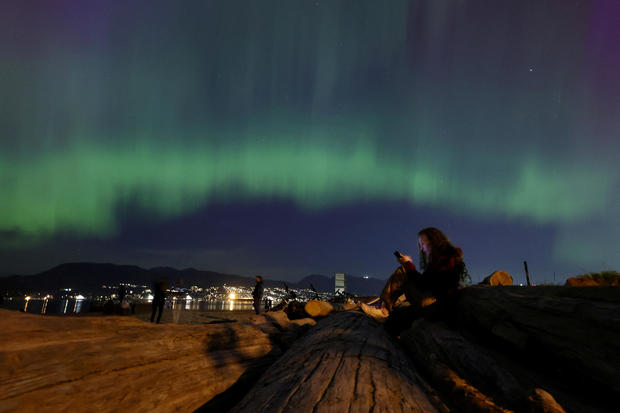 The aurora borealis, also known as the "northern lights", illuminates the sky over Vancouver 