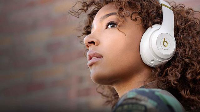 Woman wearing Beats headphones 