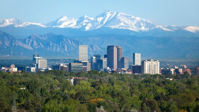 Denver Colorado skyscrapers snowy Longs Peak Rocky Mountains summer 